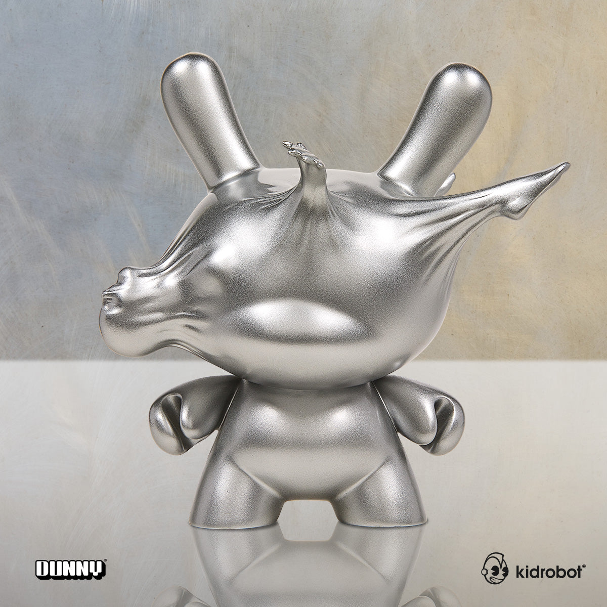 DCON 2022: Breaking Free 8" Resin Dunny by WHATSHISNAME - Metallic Silver Edition (Limited Edition)
